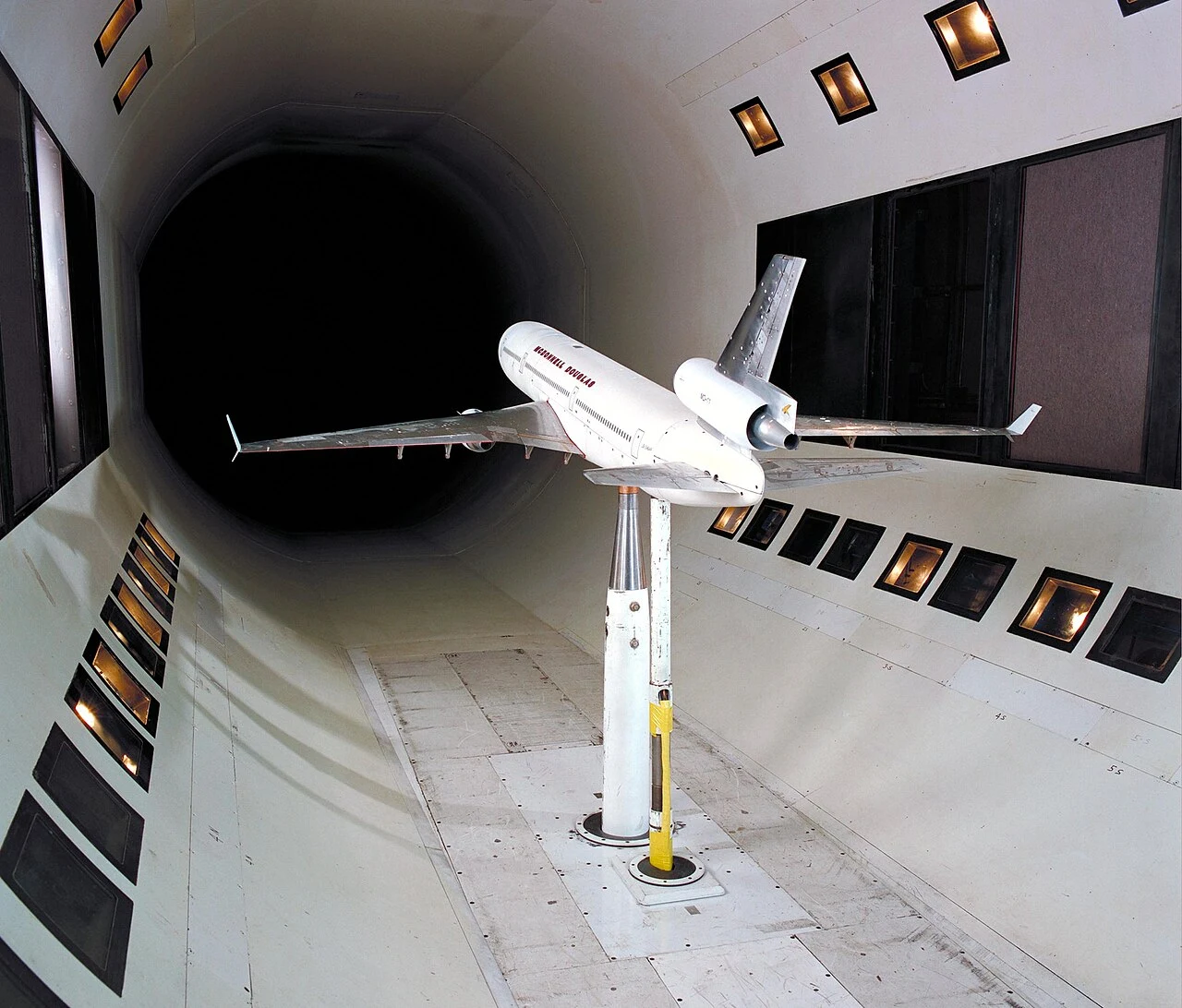 MD-11 aircraft model mounted for aerodynamic wind-tunnel testing
